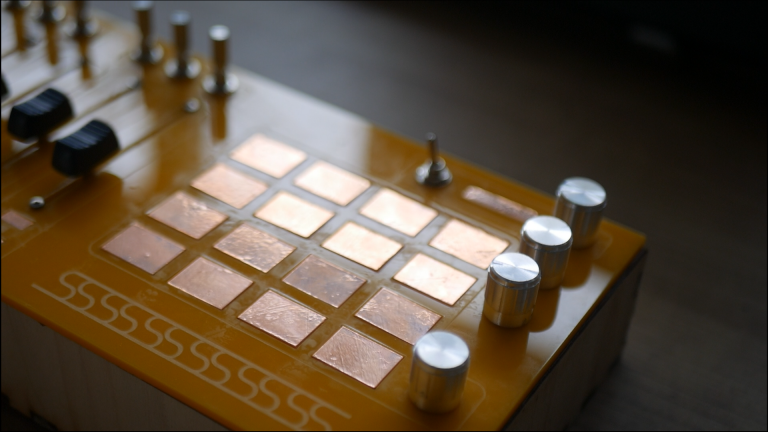 A picture of a yellow midi controller DIY self-build